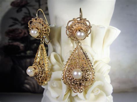 drop pearl chandelier earrings.